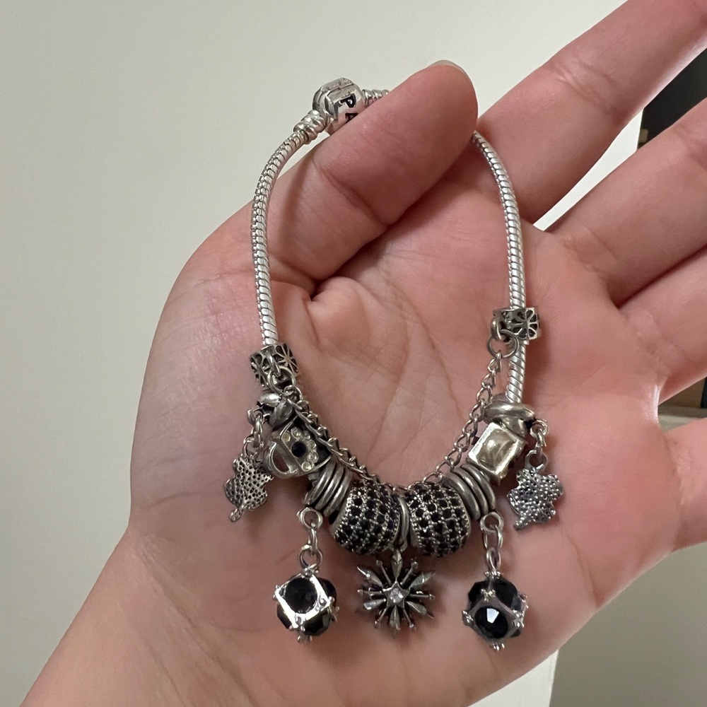 Pandora bracelet i think it fits small hands/ not kids just small, new never use